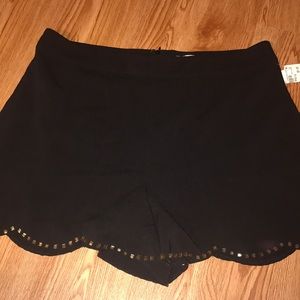 Black shorts with gold beading